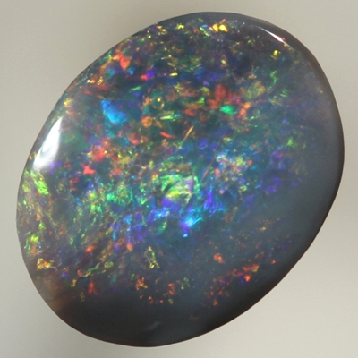 SOLID BLACK OPAL Bright, sparkling red fire dominates